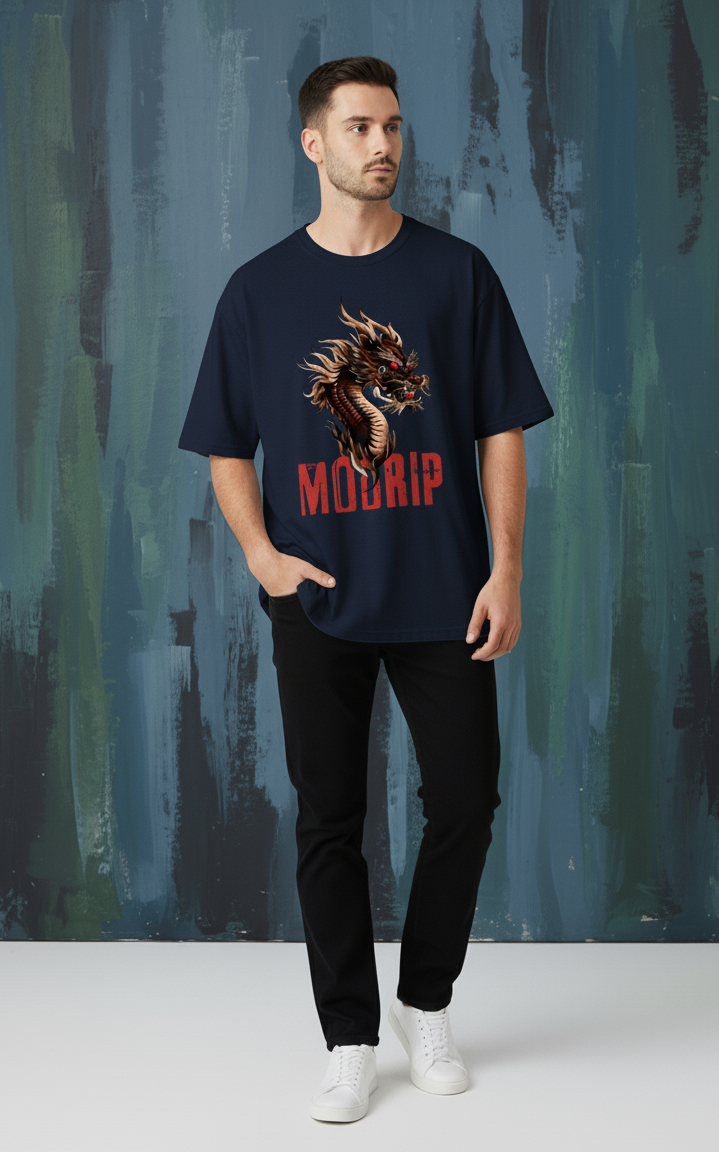 Man wearing a navy blue t-shirt with a dragon graphic and 'MODRIP' text against a textured wall.